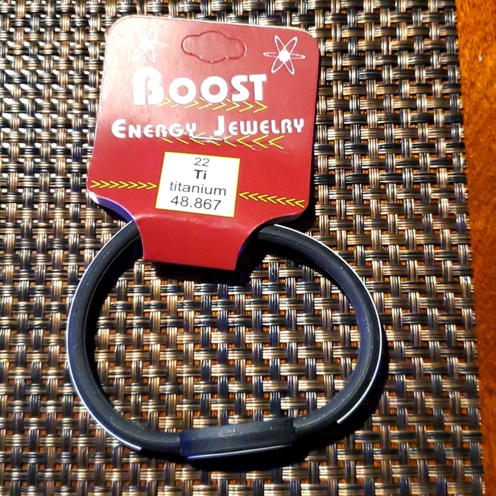 Boost energy bracelet brand new  - Black and white plastic